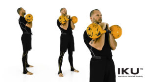 Double Kettlebell Racked Carry Exercise